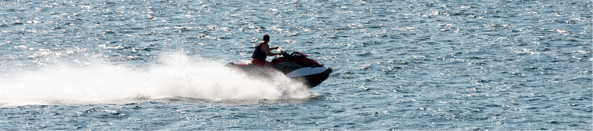 Jet ski rider on open water