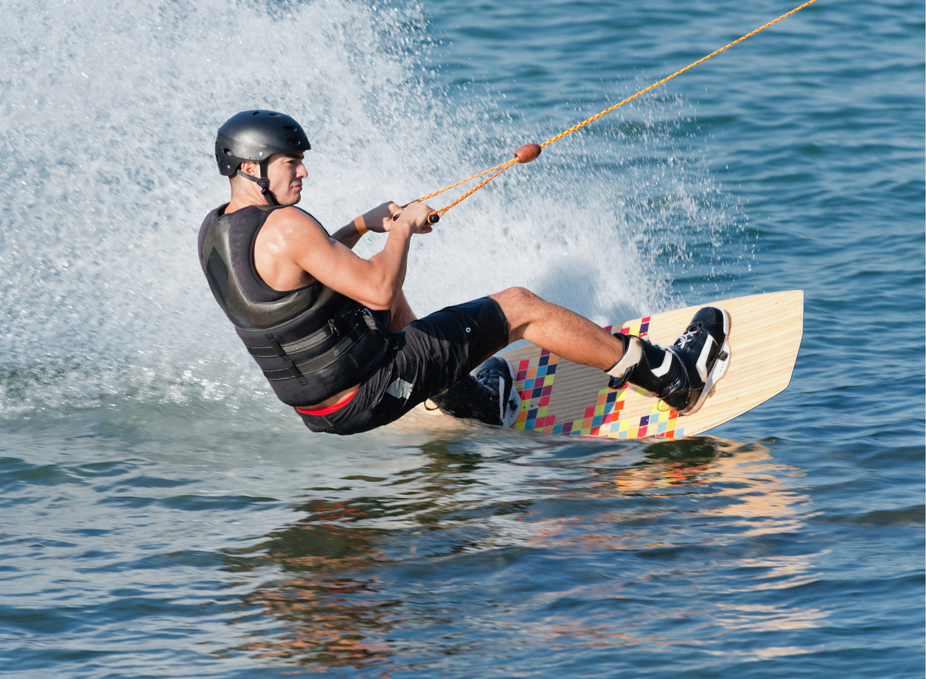 Waterskier being towed behind a boat